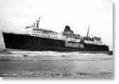 Her bow rising from the surf, the Vortigern has to await help.